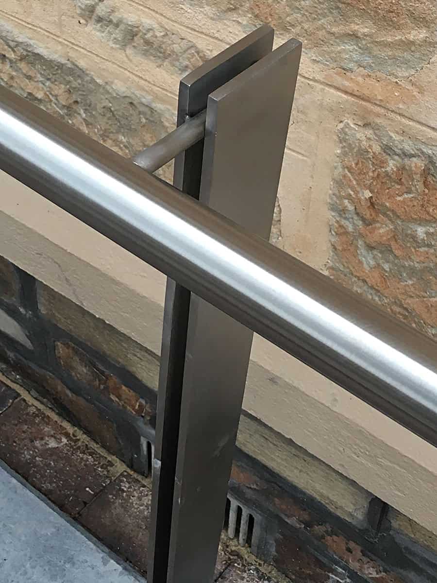stainless-steel-handrails-stone-detail